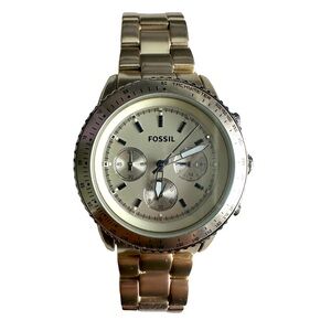 Dull Gold Fossil women’s watch with brand new battery .